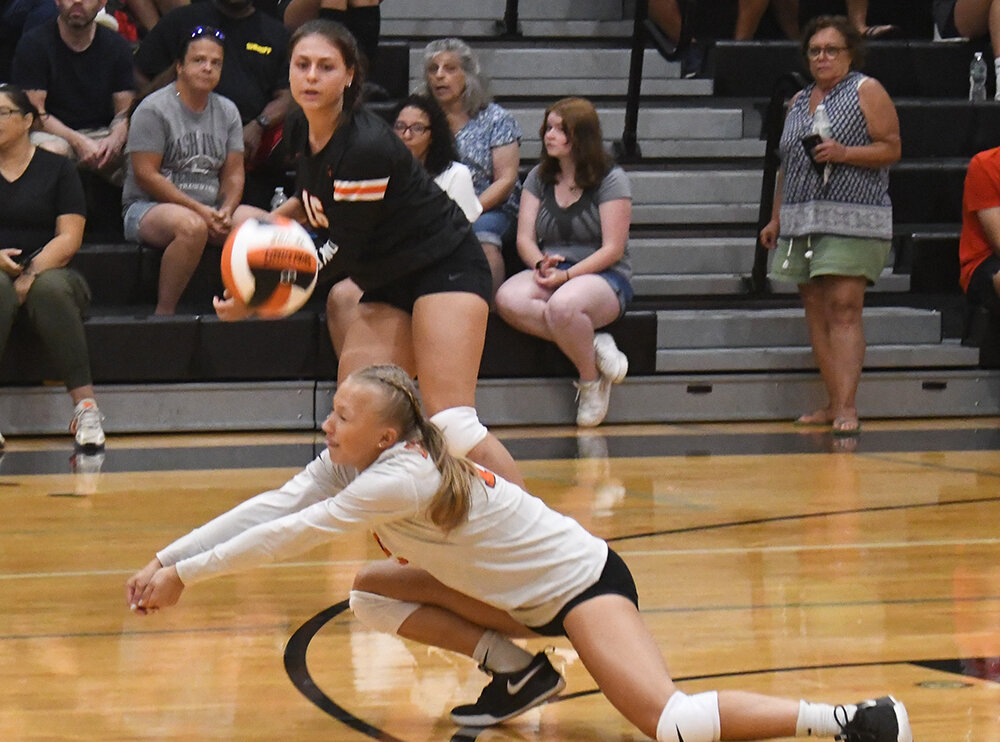 Marlboro’s Kalista Birkenstock goes after the ball as teammate Katie Thorne looks on during a non-league volleyball match on Sept. 5 at Marlboro High School.